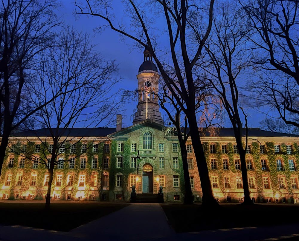 A photo of an academic building at dusk.
