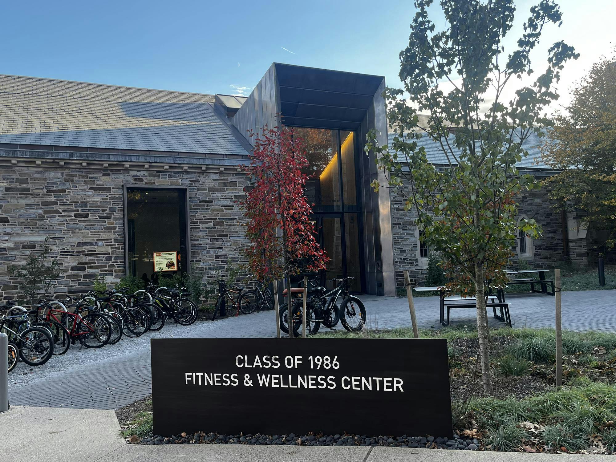 Stone building with bikes placed outside.