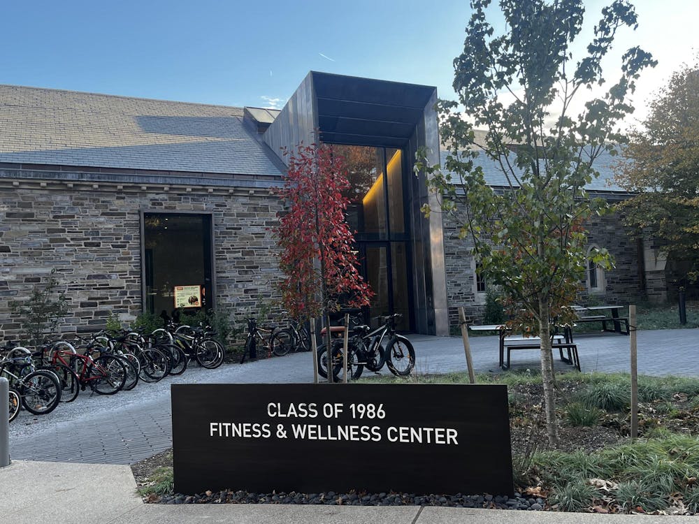 Stone building with bikes placed outside.