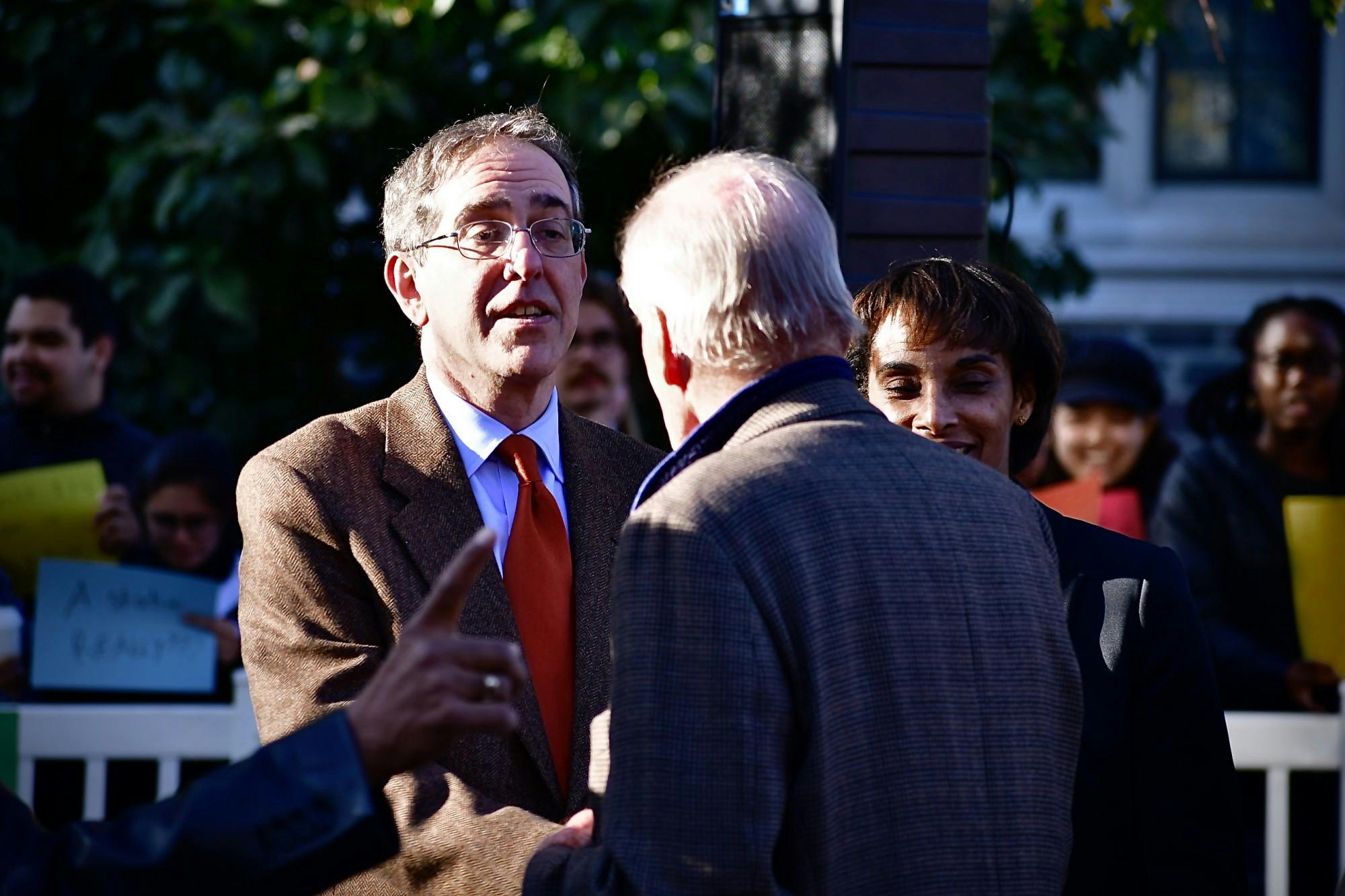 Eisgruber shaking hands