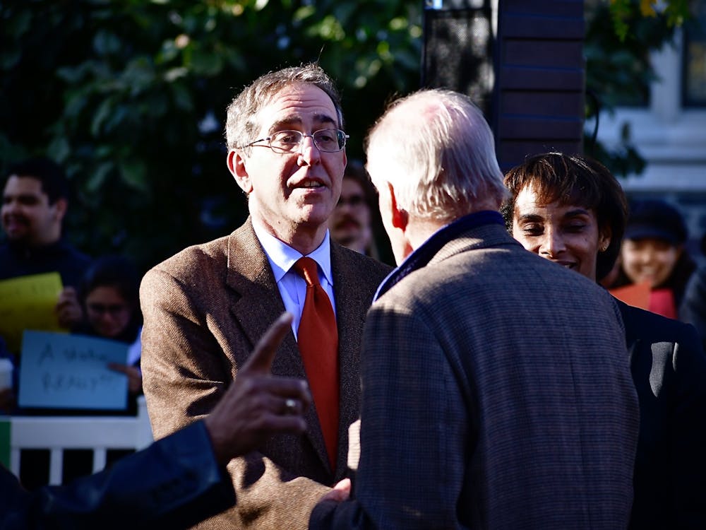 Eisgruber shaking hands