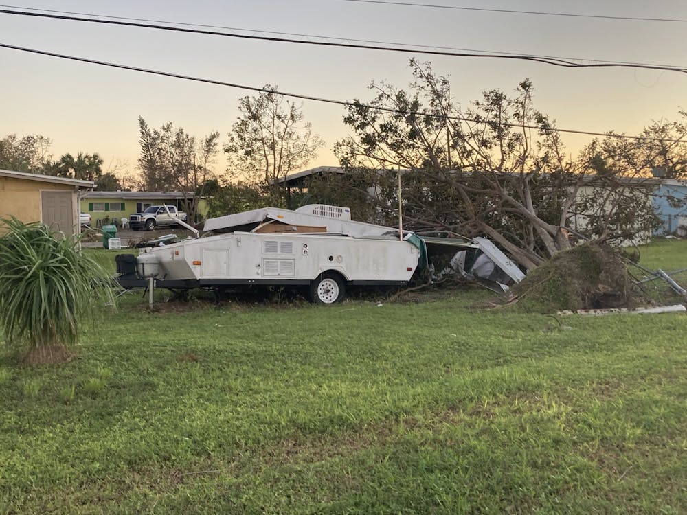 <h5>A camper and a tree destroyed in Port Charlotte, Florida following Hurricane Ian.</h5>
<h6><strong>CC 2.0 / </strong><a href="https://commons.wikimedia.org/wiki/File:Hurricane_Ian_Damage_in_Port_Charlotte_6.jpg" target="_self"><strong>Wikimedia Commons</strong></a></h6>