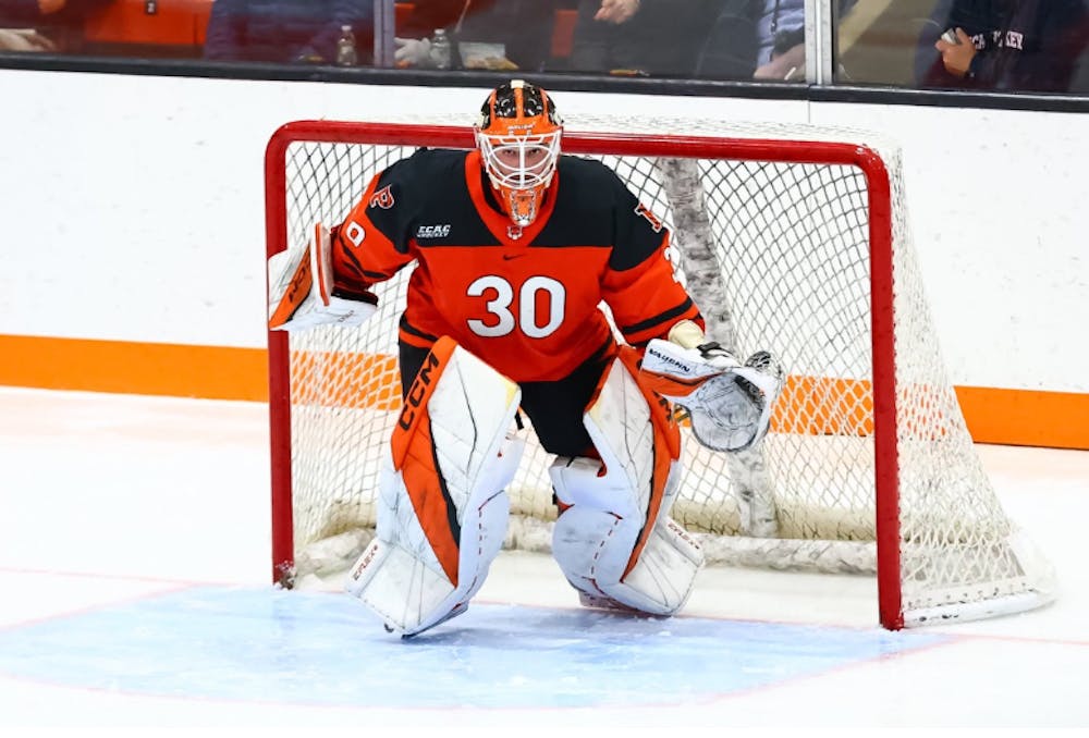 Princeton hockey goalie at end of ice.