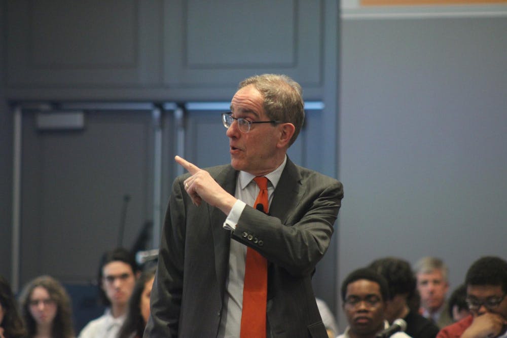 University President Christopher Eisgruber ’83 in front of a crowd. 