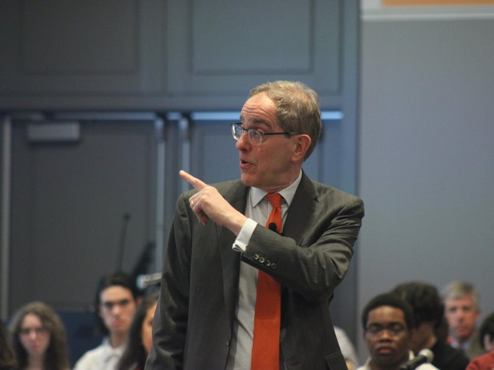 University President Christopher Eisgruber ’83 in front of a crowd.