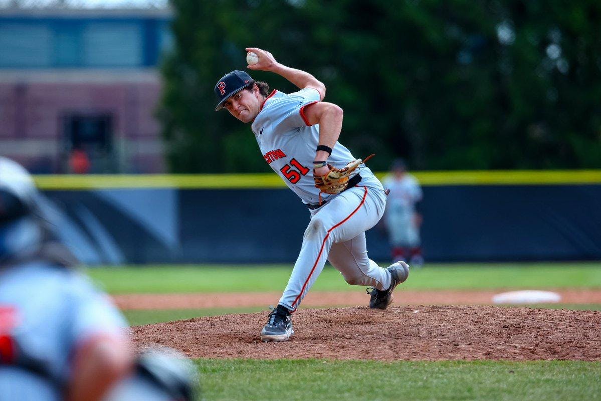 Princeton pitcher winding up to throw towards home 