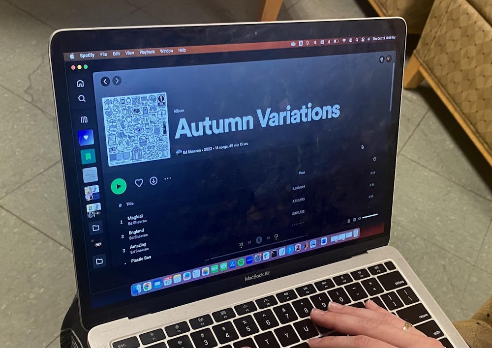 A picture of someone playing "Autumn Variations" by Ed Sheeran on their laptop.