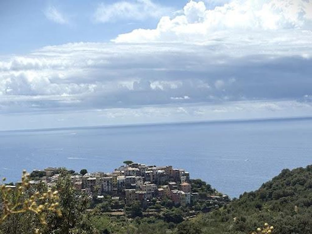 View from Italian hike of water and village.