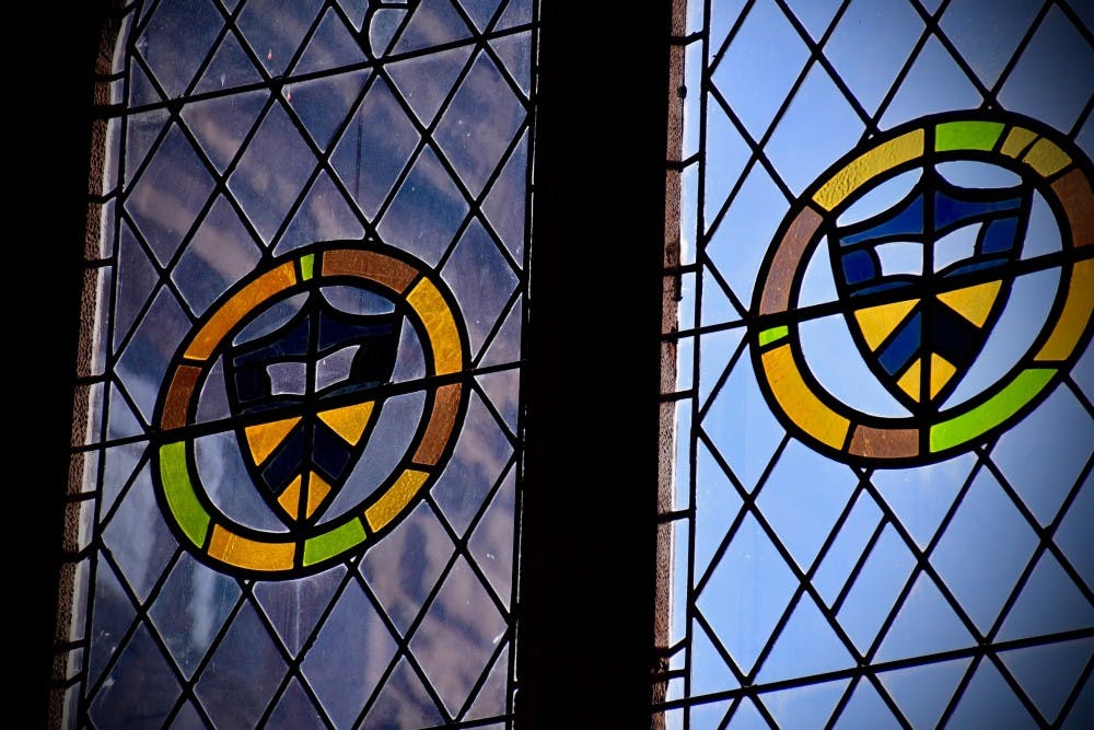 <h6>Sunlight streams through stained glass windows in East Pyne Hall.</h6>
<h6>Jon Ort / The Daily Princetonian</h6>