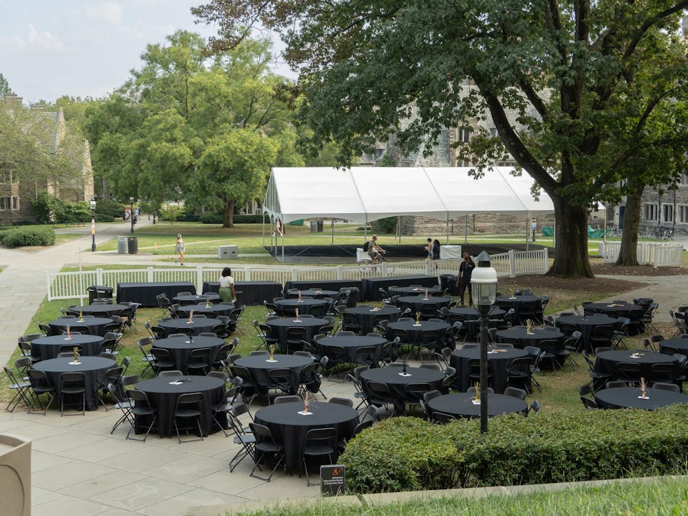 Tables are set up in the courtyard in front of the U-Store for the B(l)ack Together dinner hosted by the Black Student Union.