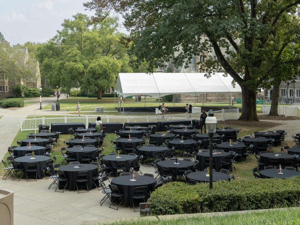 Tables are set up in the courtyard in front of the U-Store for the B(l)ack Together dinner hosted by the Black Student Union. 