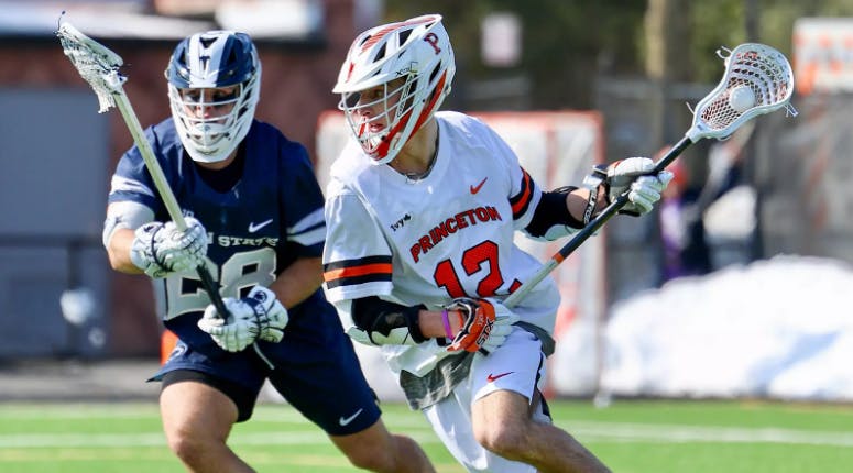 Princeton men's lacrosse player on offense.