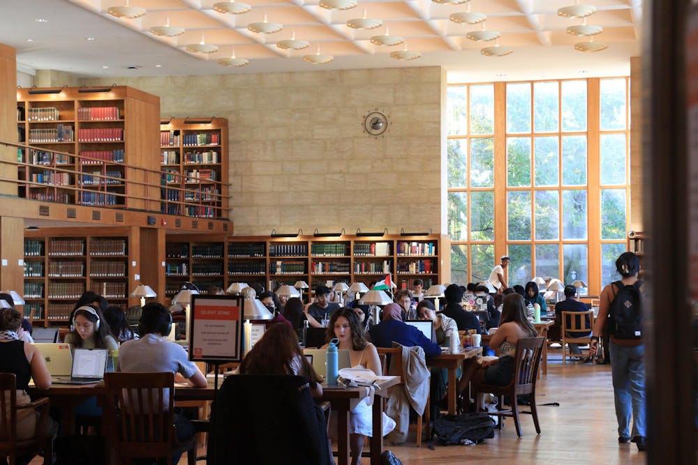 <h5>Students study in Firestone Trustee Room during a pro-Palestine sit-in.</h5><h6>Jean Shin / The Daily Princetonian</h6>