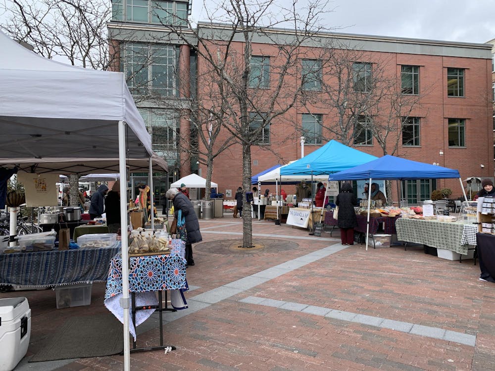 Vendors and their stalls of food and other goods are on-display in front of the Princeton Public Library. 