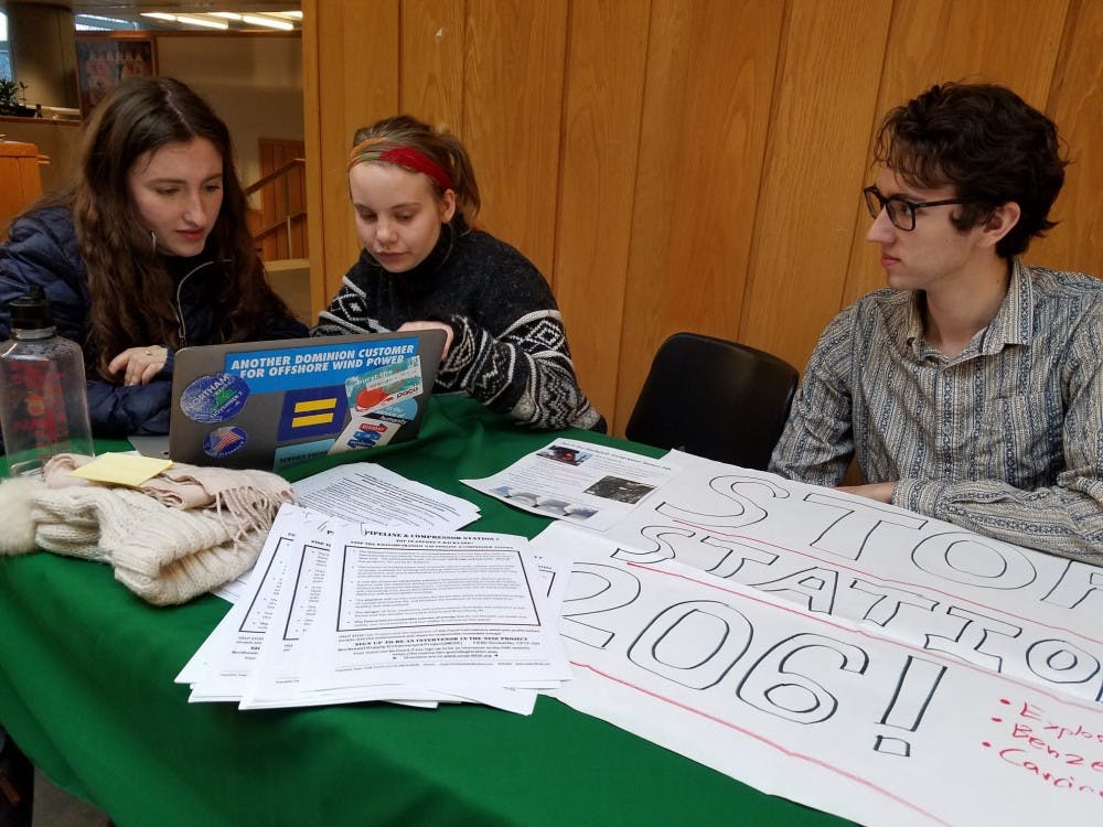 Members of PSCI tabling in Frist Campus Center.