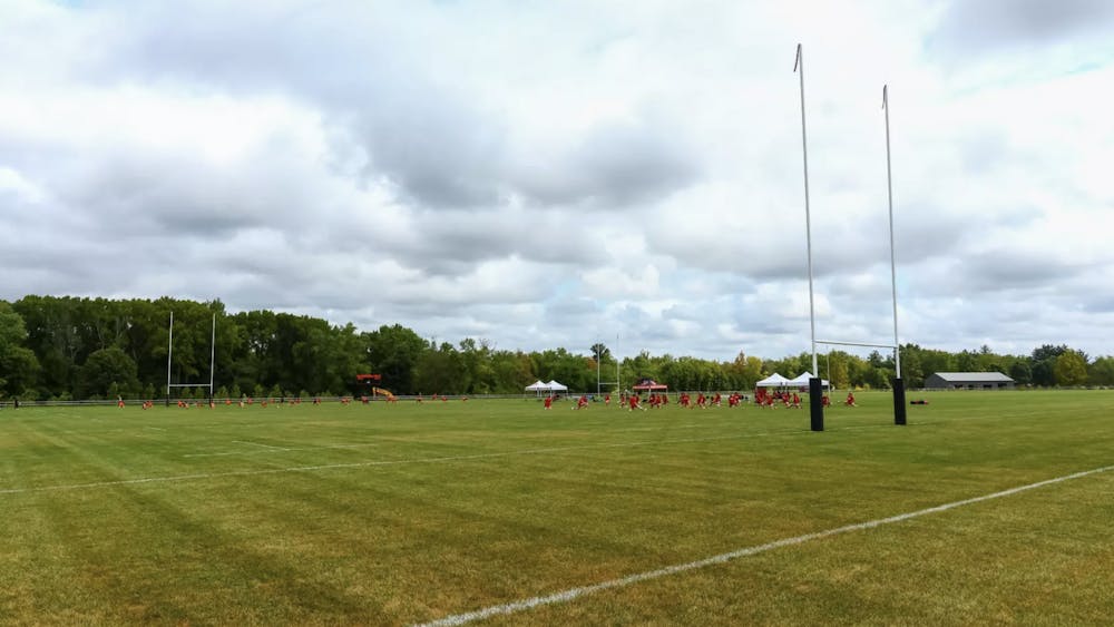A picture of a green rugby field
