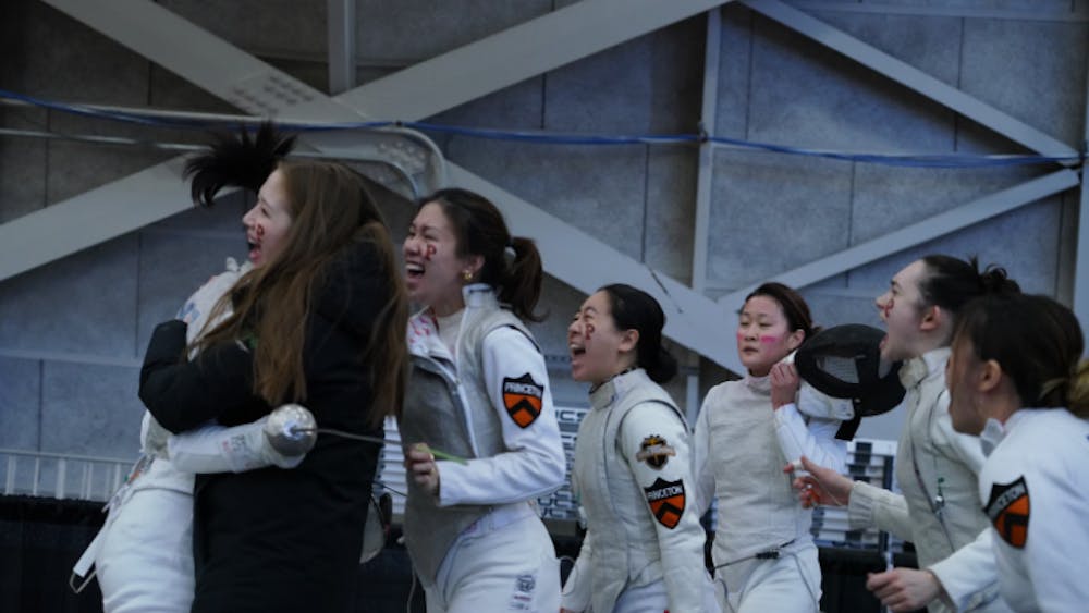 Princeton women's fencing celebrating.