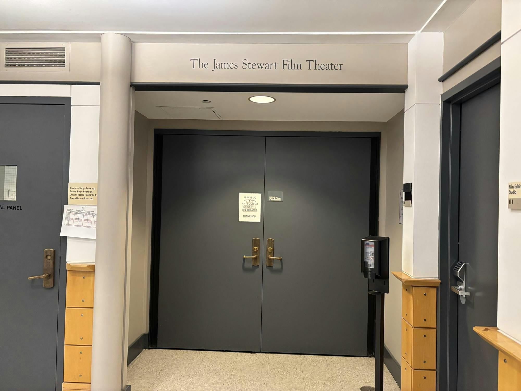 Grey double-door entrance with "The James Stewart Film Theater" written above it.