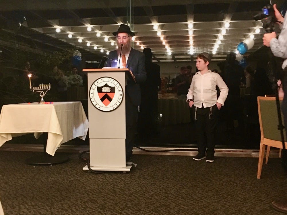  Rabbi Eitan Webb spoke at the Prospect House Hanukkah event Thursday night