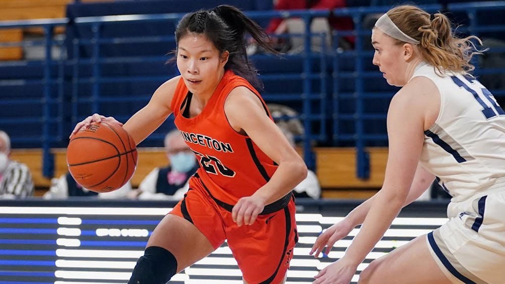 <h5>Kaitlyn Chen drives to the basket against Yale on Jan. 28, 2022. The Tigers won 61-49.</h5>
<h6>Courtesy of <a href="http://goprincetontigers.com." target="_self">Go Princeton Tigers</a>.</h6>