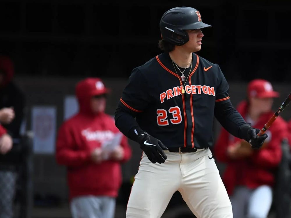A man steps up to the plate on a baseball field.