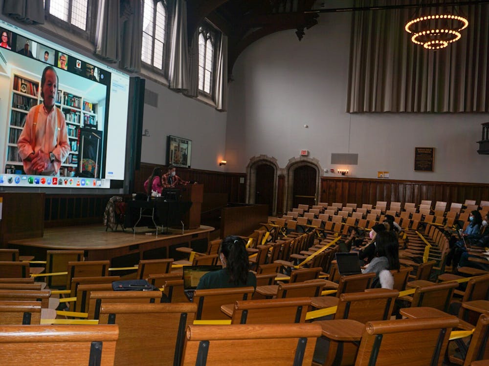Students in McCosh 50 while Professor David Miller teaches on Zoom
John Raulston Graham / The Daily Princetonian