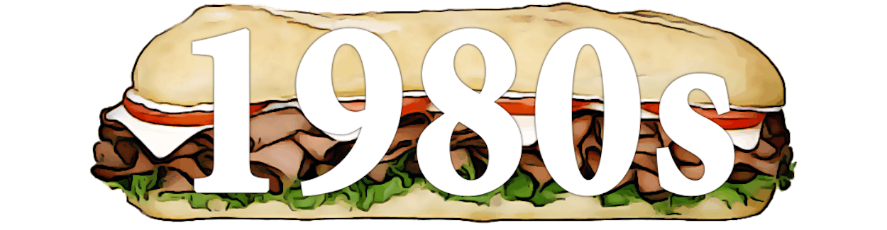 A large hoagie sandwich with the text "1980s" overlaid in white.
