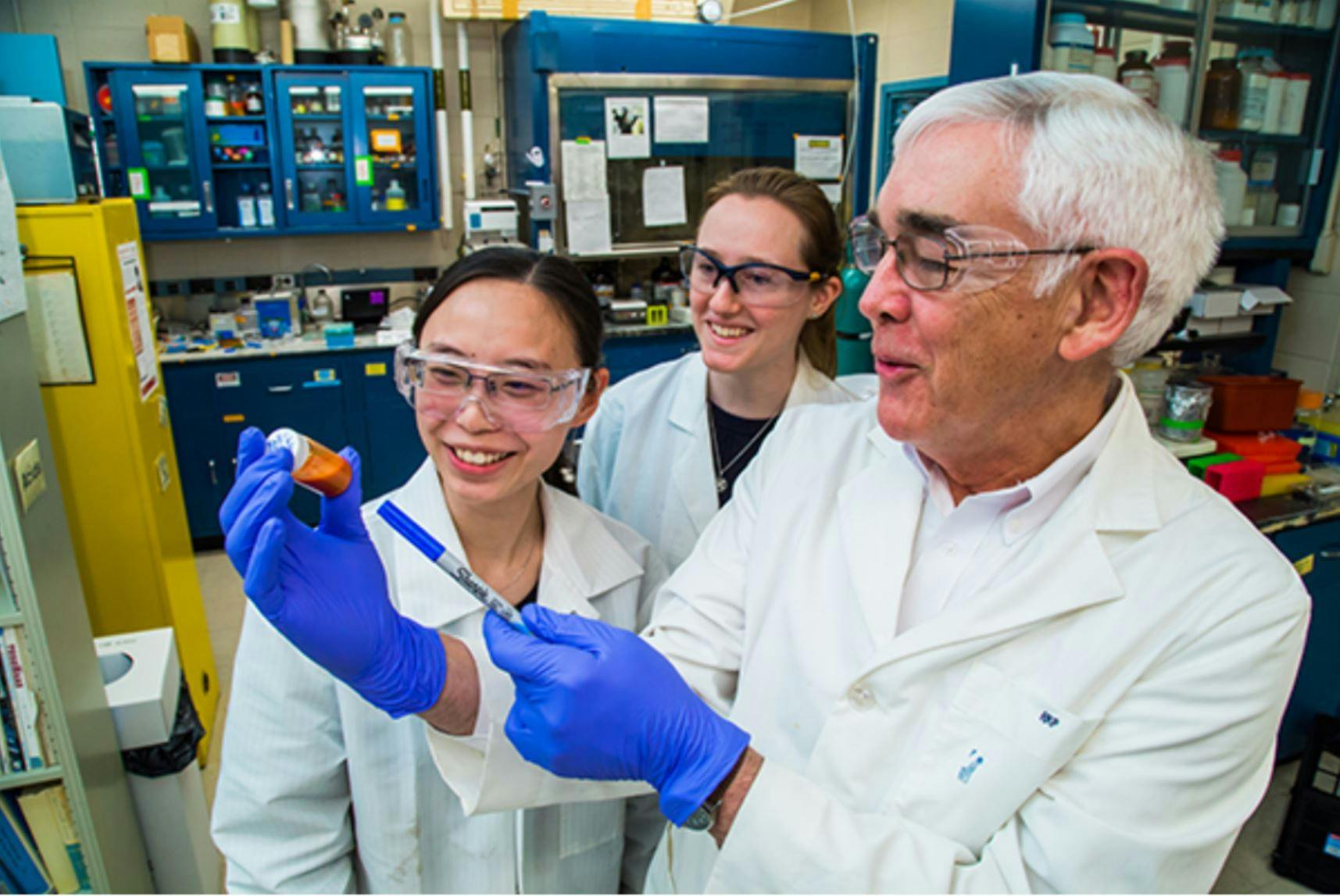 Prud'homme and students working on the Gates project.