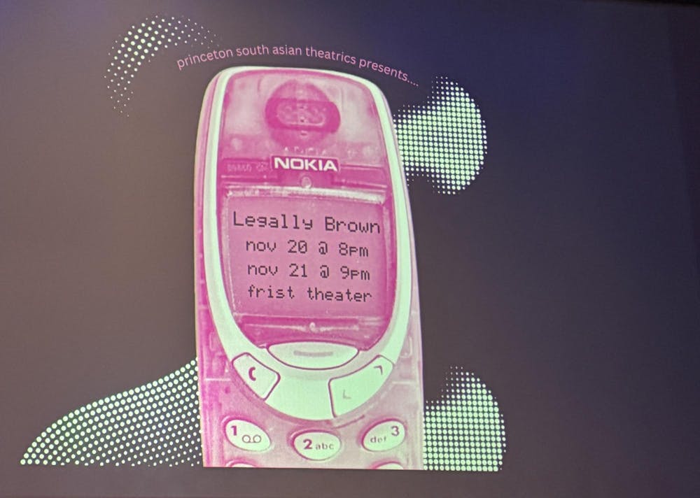 An image of a pink Nokia phone projected on a screen
