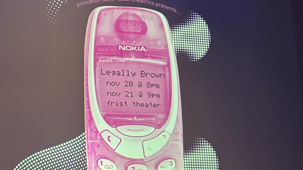 An image of a pink Nokia phone projected on a screen