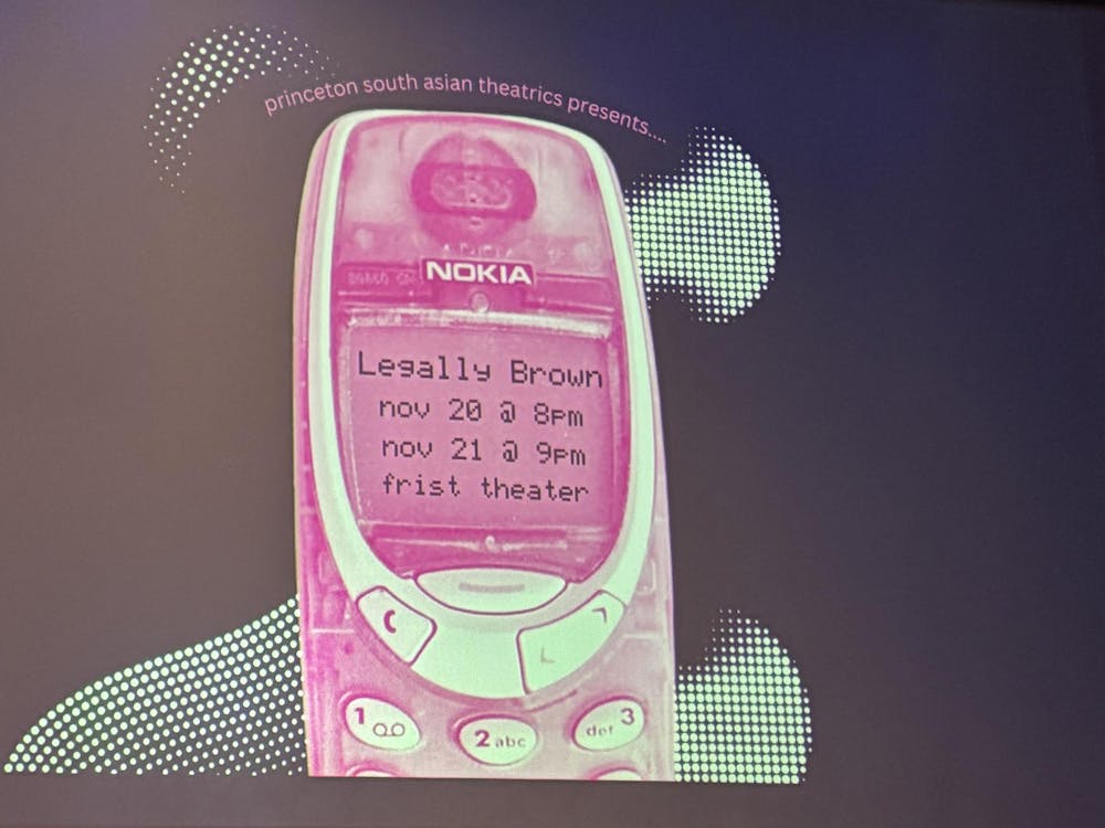 An image of a pink Nokia phone projected on a screen