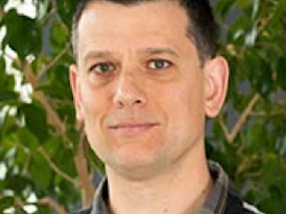 Geosciences professor Gabriel Vecci