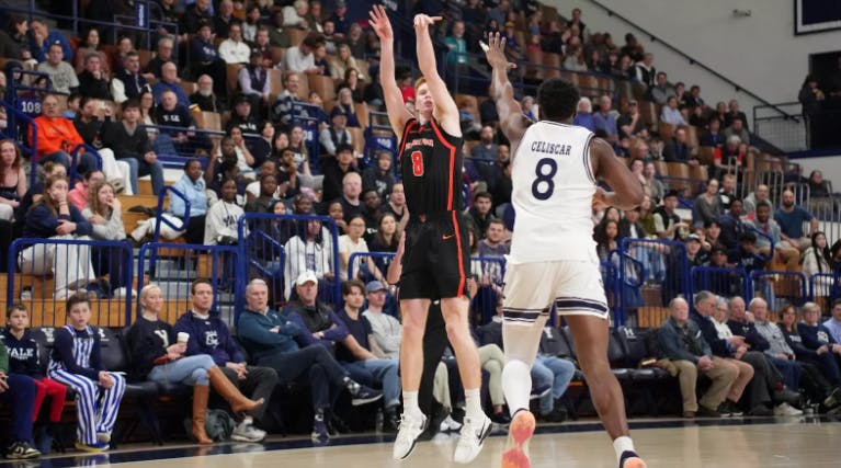 Princeton men's basketball player shooting.