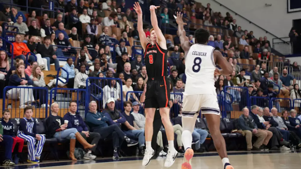 Princeton men's basketball player shooting.