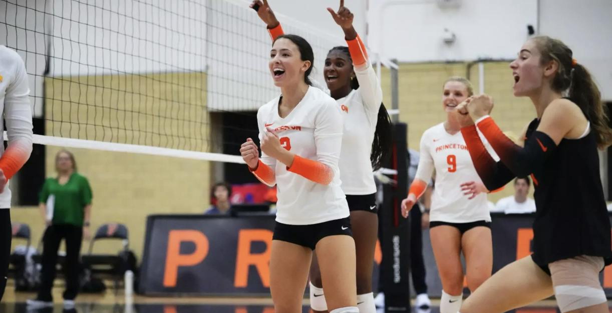 Princeton women's volleyball players celebrating.