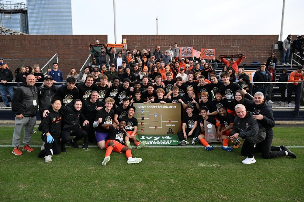 Princeton players pose with their supporters in Philly 