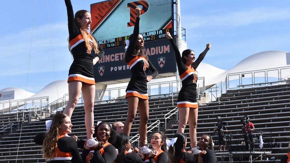 The Princeton cheerleading team performs on the sidelines at the Ivy League opener against Columbia.&nbsp;
Angel Kuo / The Daily Princetonian