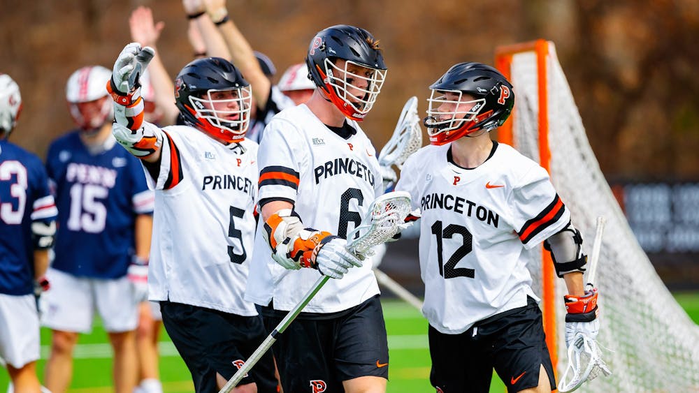 <h5>Chris Brown (middle) scored the winning goal for the Tigers in OT.&nbsp;</h5>
<h6><a href="https://twitter.com/TigerLacrosse/status/1505539406073147397/photo/1" target="_self"><strong>@TigerLacrosse/Twitter.&nbsp;</strong></a></h6>