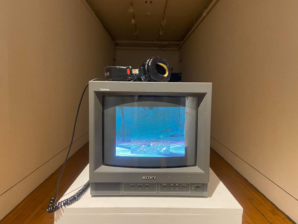 A Sony television monitor with a pair of headphones placed on top of it.