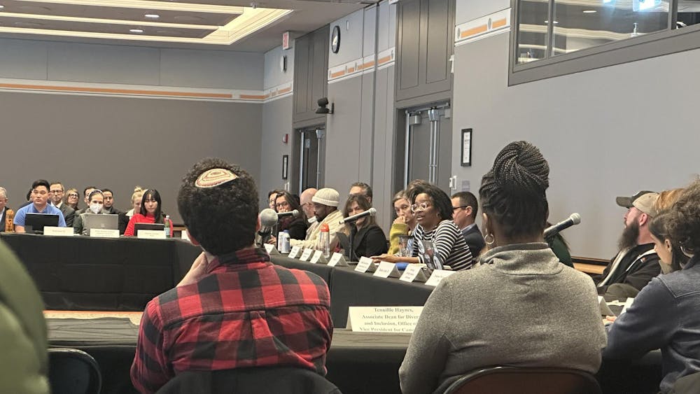 CPUC members are pictured at the meeting in the Frist MPR.