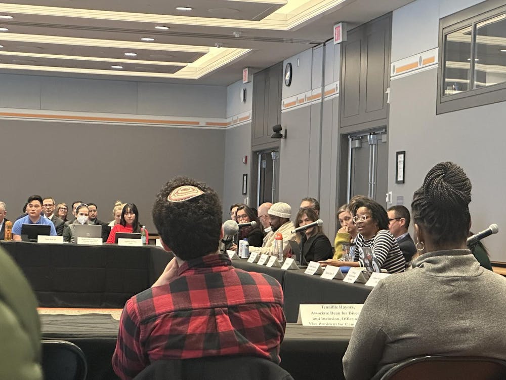 CPUC members are pictured at the meeting in the Frist MPR.