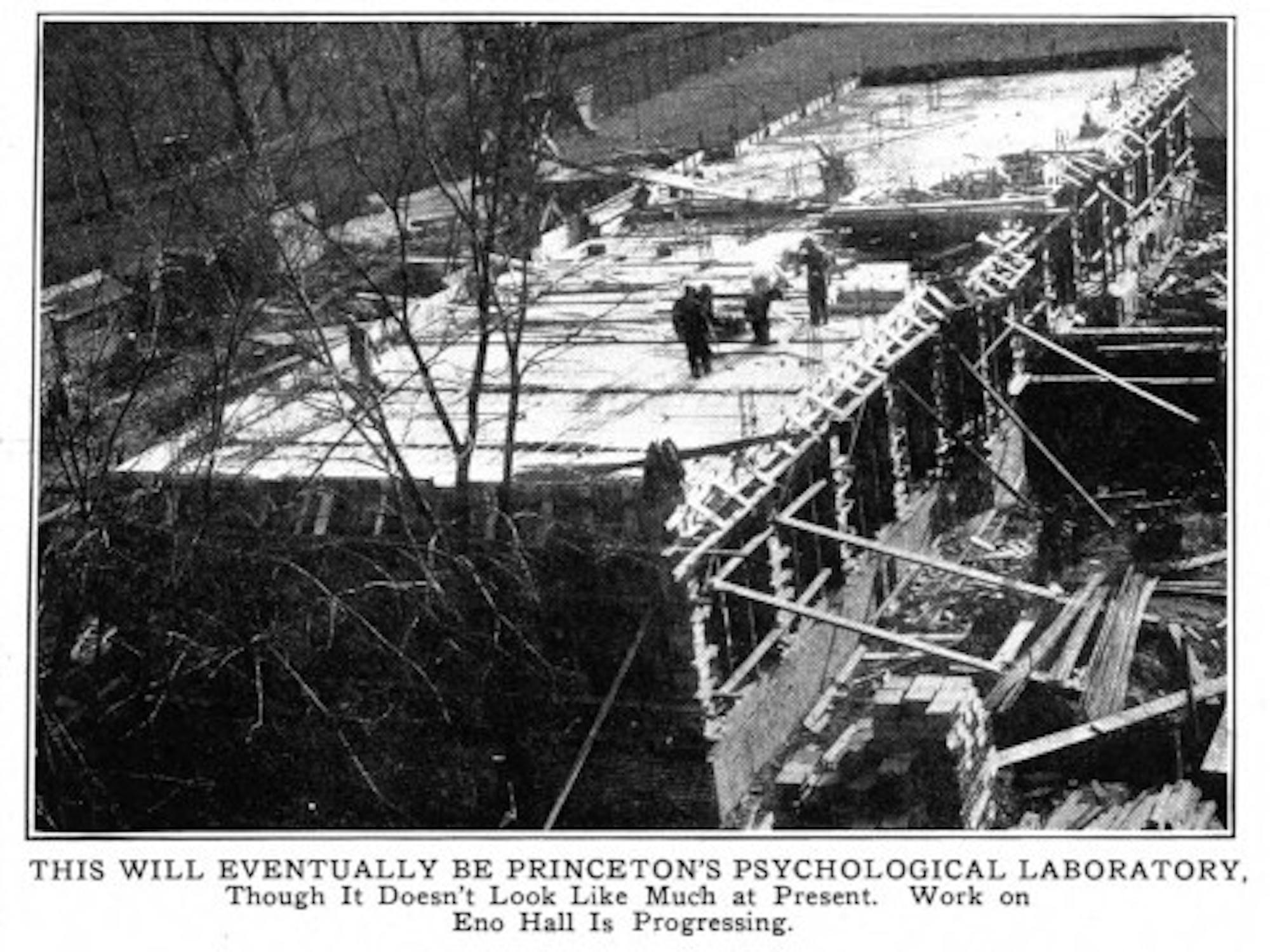 Black and white image of a building in construction.