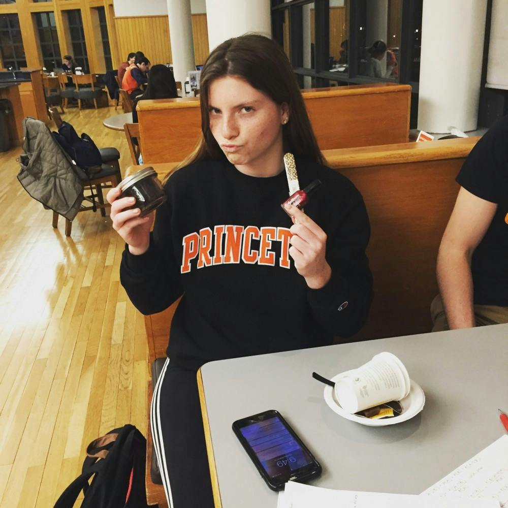 Student poses with her prize after winning a meme Kontest. Image Credits: Kardashian Lifestyle Klub.