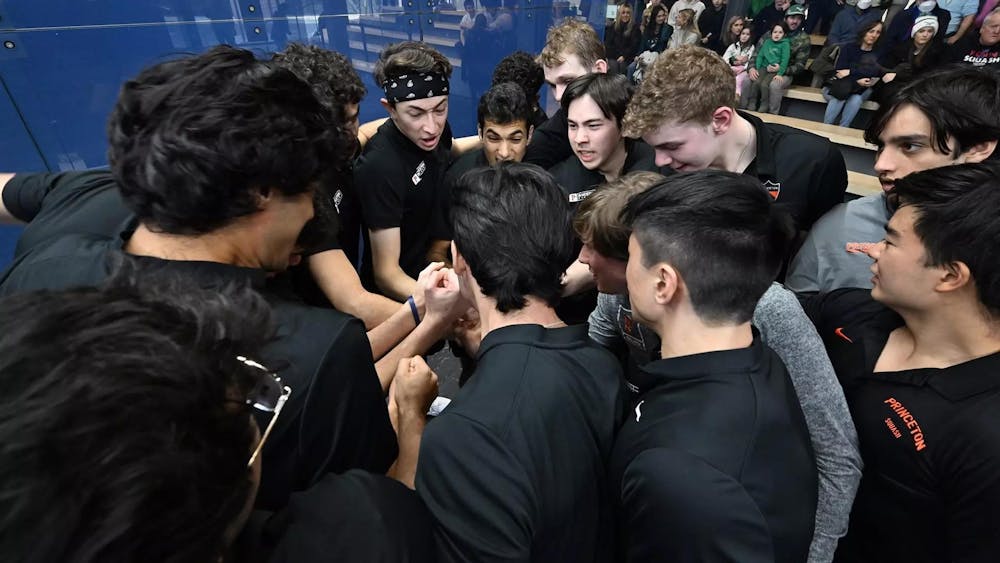 Players in black shirts huddle up 