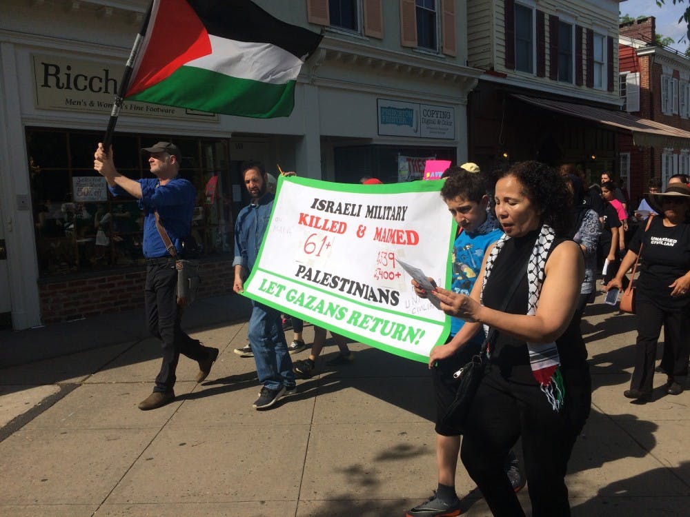 Mourners marching down Nassau Street on May 20.