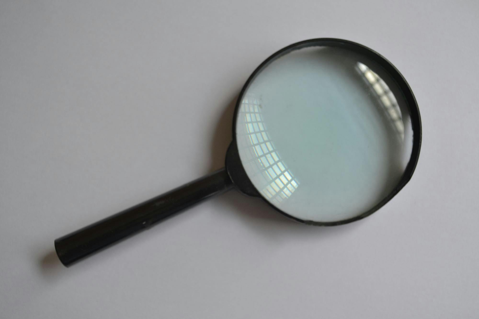 Magnifying glass on white background