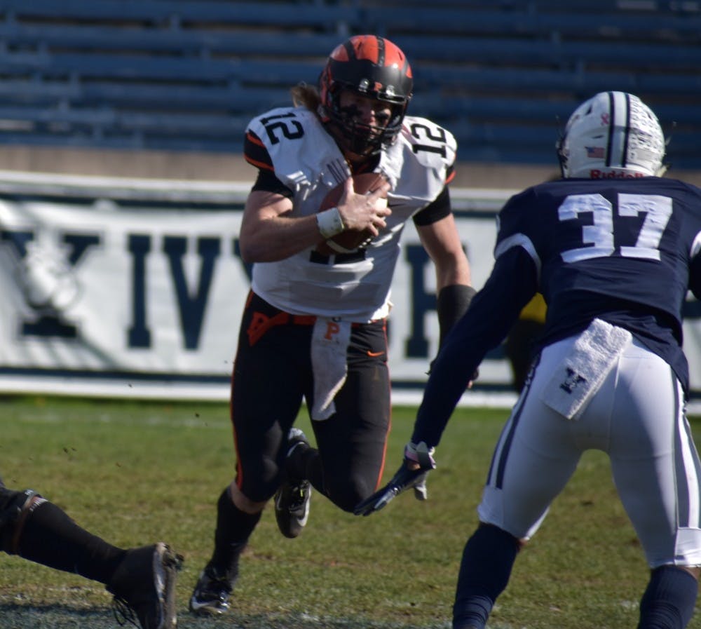John Lovett carries the ball in a 2018 game against Yale. Photo Credit: Jack Graham / The Daily Princetonian