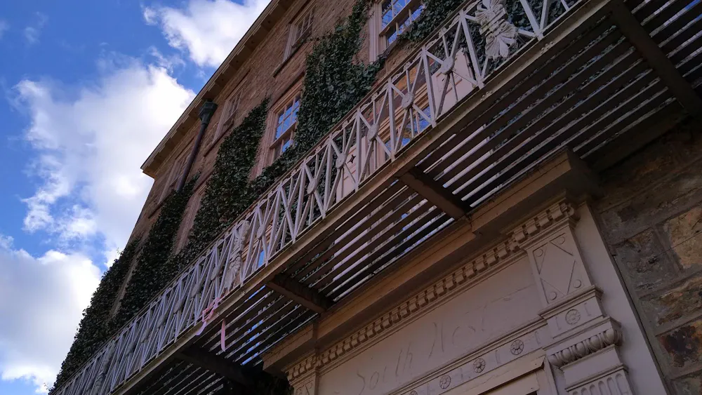 A building with a sky blue background.