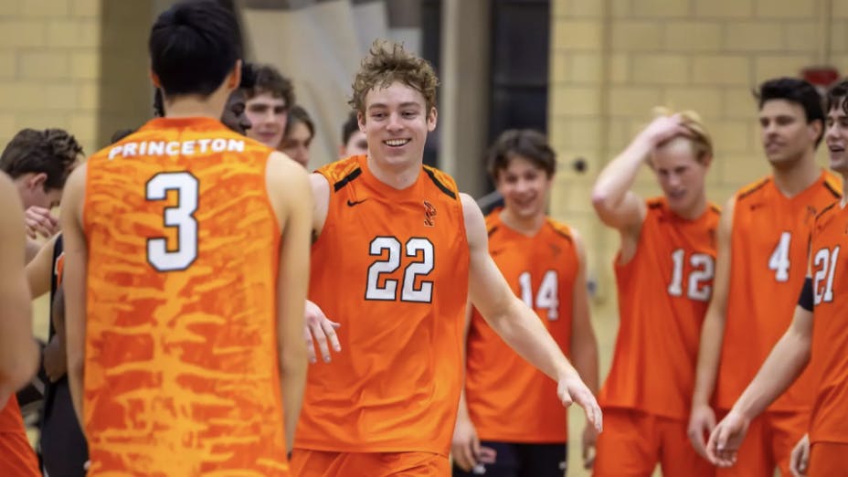 Princeton men’s volleyball players celebrate a much-earned victory.