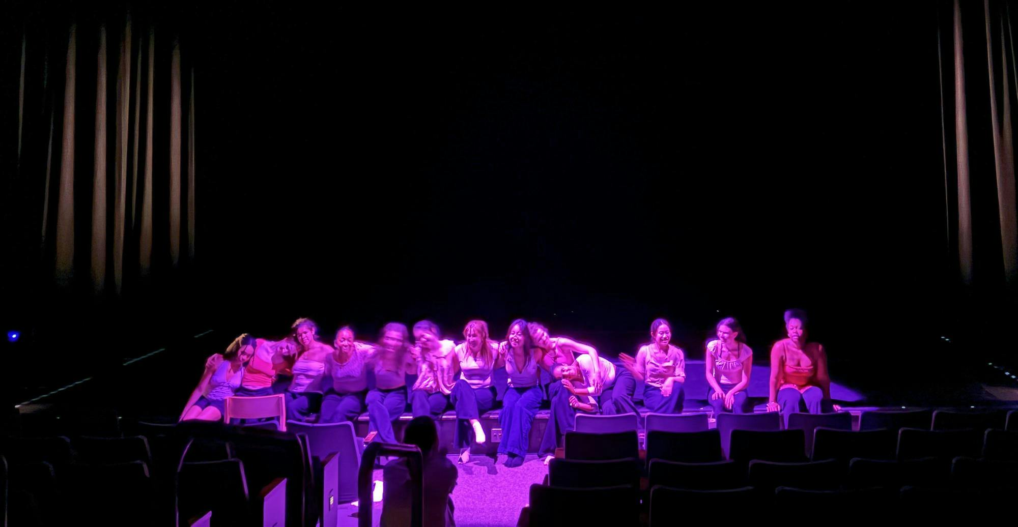 A group of eXpressions dancers line the stage.